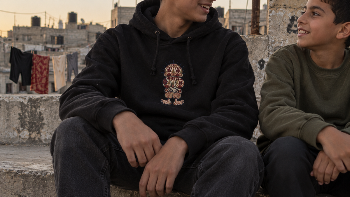 Handala hoodie worn during a rooftop conversation
