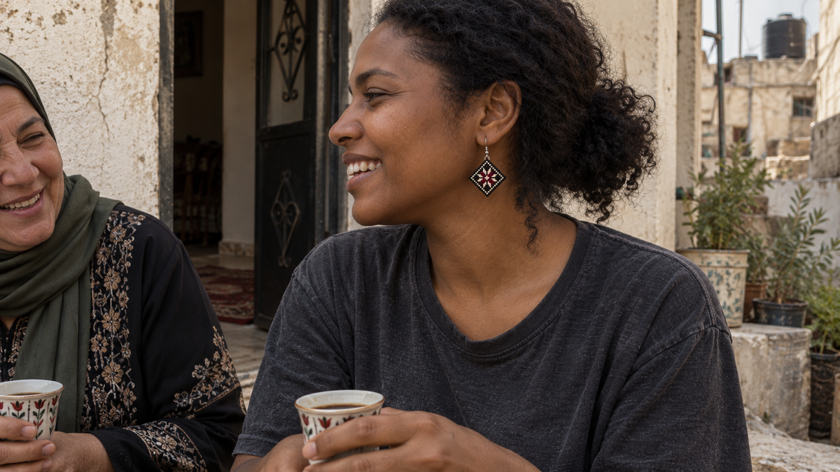 Star tatreez earring worn while sharing coffee