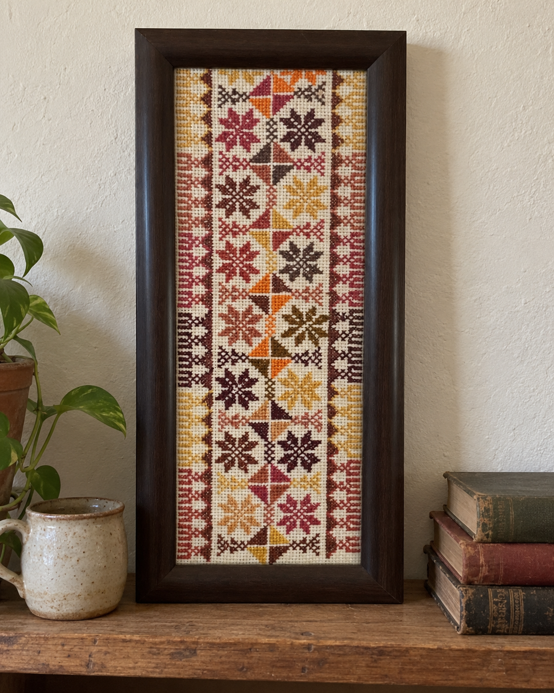 Star and Diamond Tatreez Art - Earth Tones - displayed at home