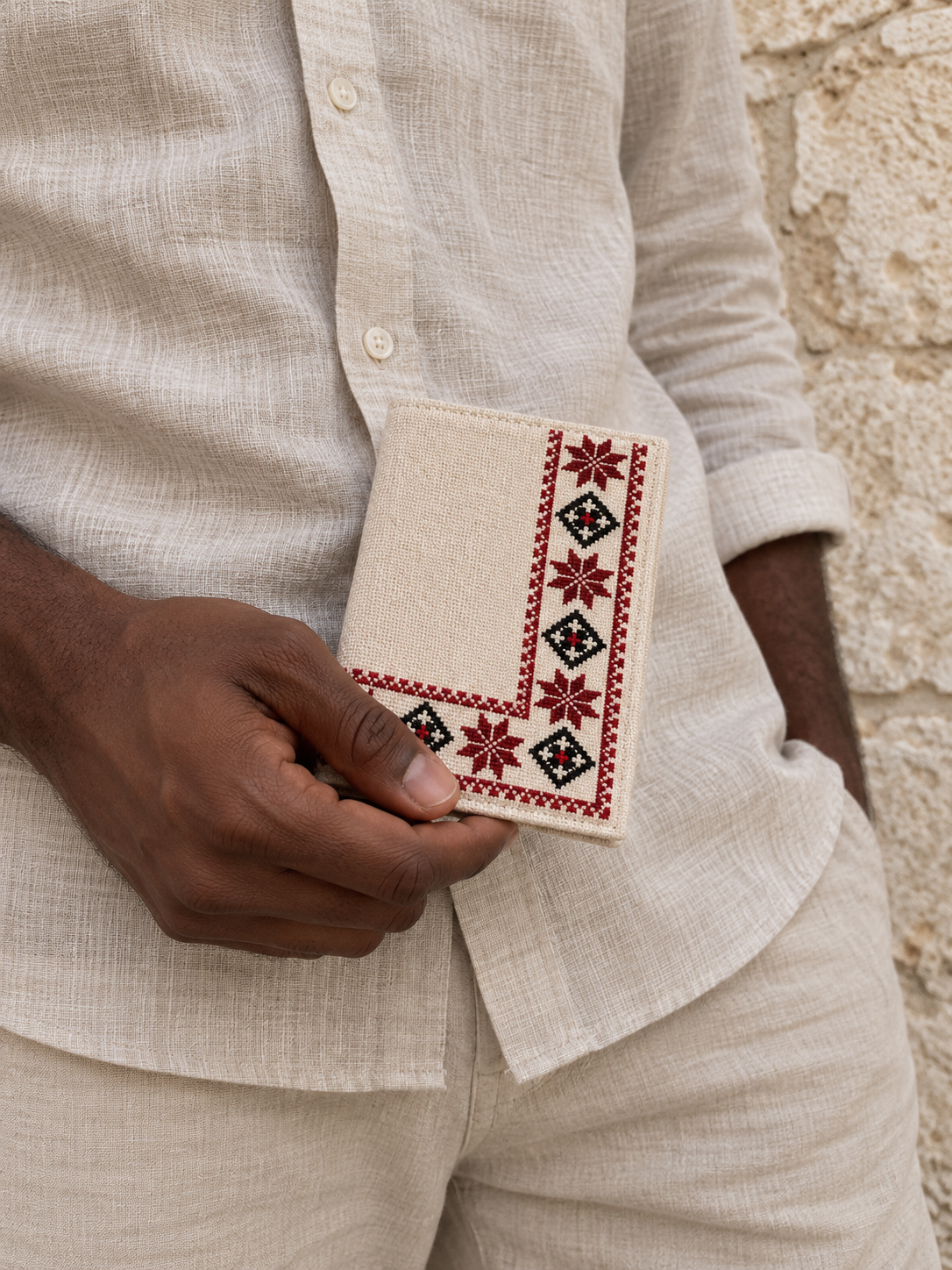Corner Border Tatreez Passport Cover - Natural - shown in use