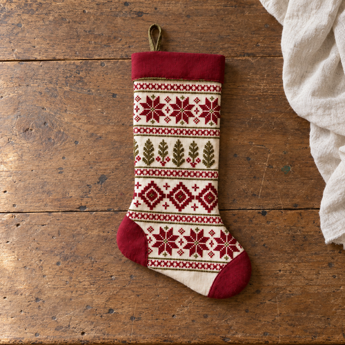 Star and Cypress Tatreez Christmas Stocking - Natural - full stocking on a wooden table
