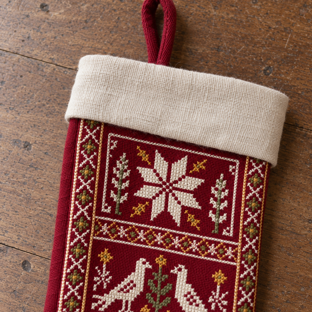 Bird and Star Tatreez Christmas Stocking - Burgundy - close-up of tatreez stitching and cuff