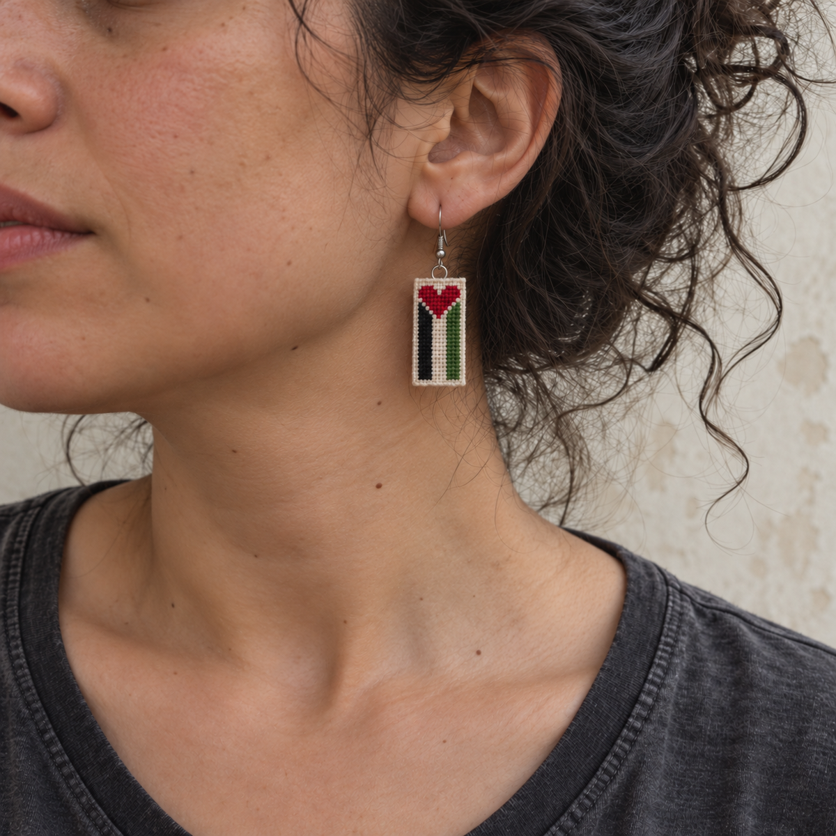 Palestine Heart Flag Tatreez Earrings - worn view