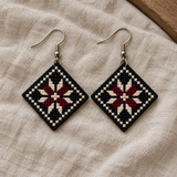 Bethlehem Star Tatreez Earrings - Black - pair on linen