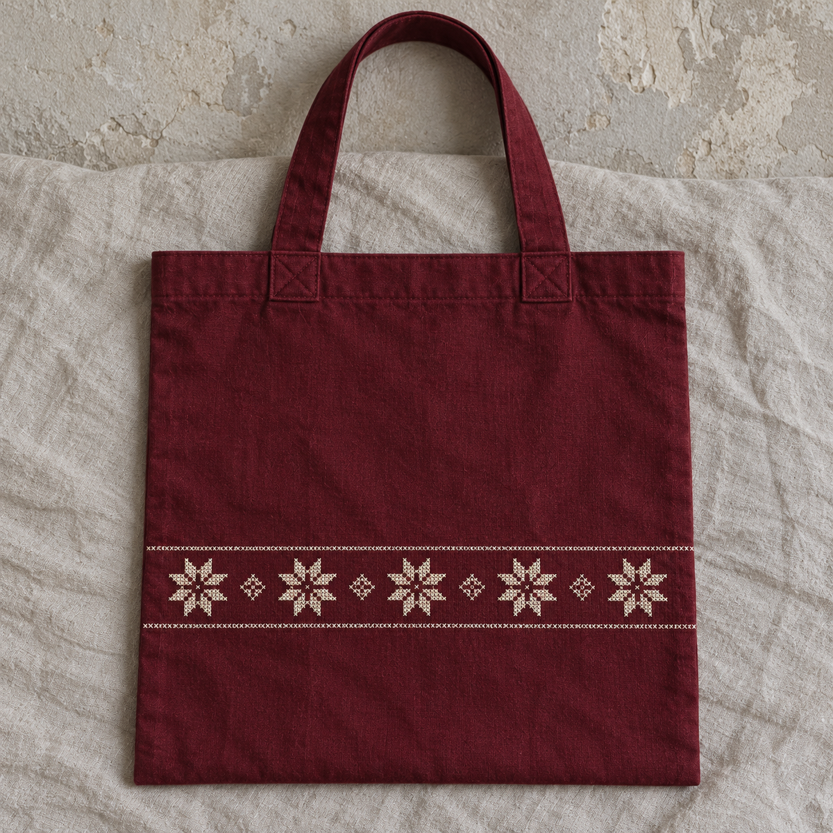 Burgundy flat cotton tote with an ivory geometric star band