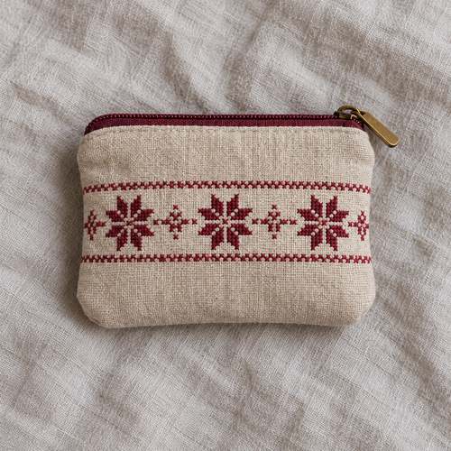 Oatmeal linen coin purse with burgundy star tatreez and a burgundy zip