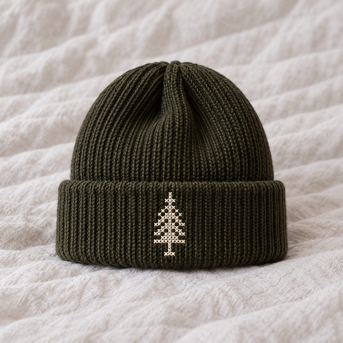 Small2.5cm ivory symmetrical stepped cypress tree on cuff, no patch.