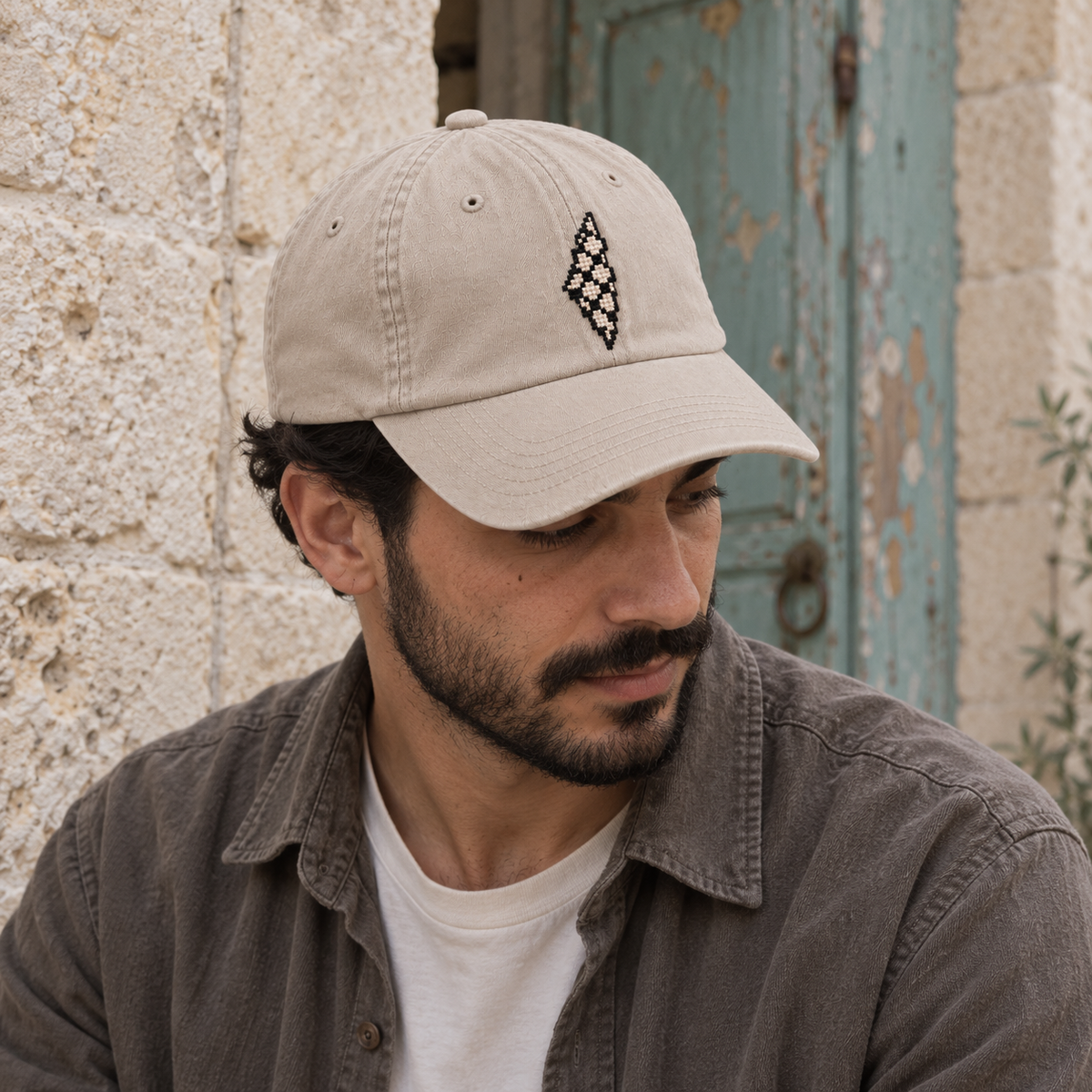 Keffiyeh Palestine Map Tatreez Cap - Cream worn on an adult model