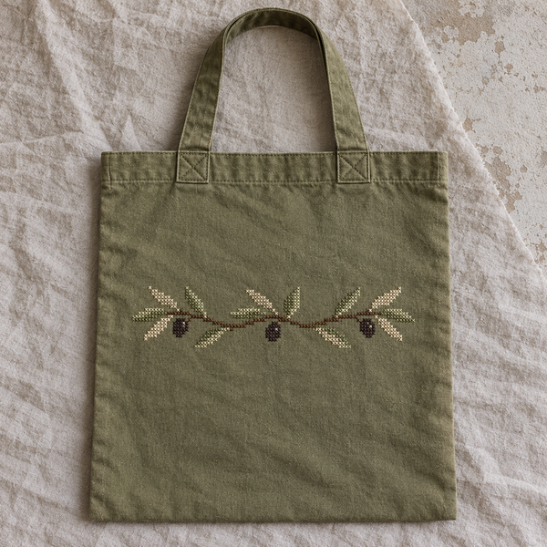 Olive cotton flat tote with a stitched olive branch