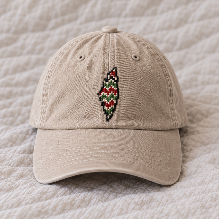 Small Palestine map with stepped red green black ivory chevrons, continuous thin stitched outline, clear blank gap above brim seam.