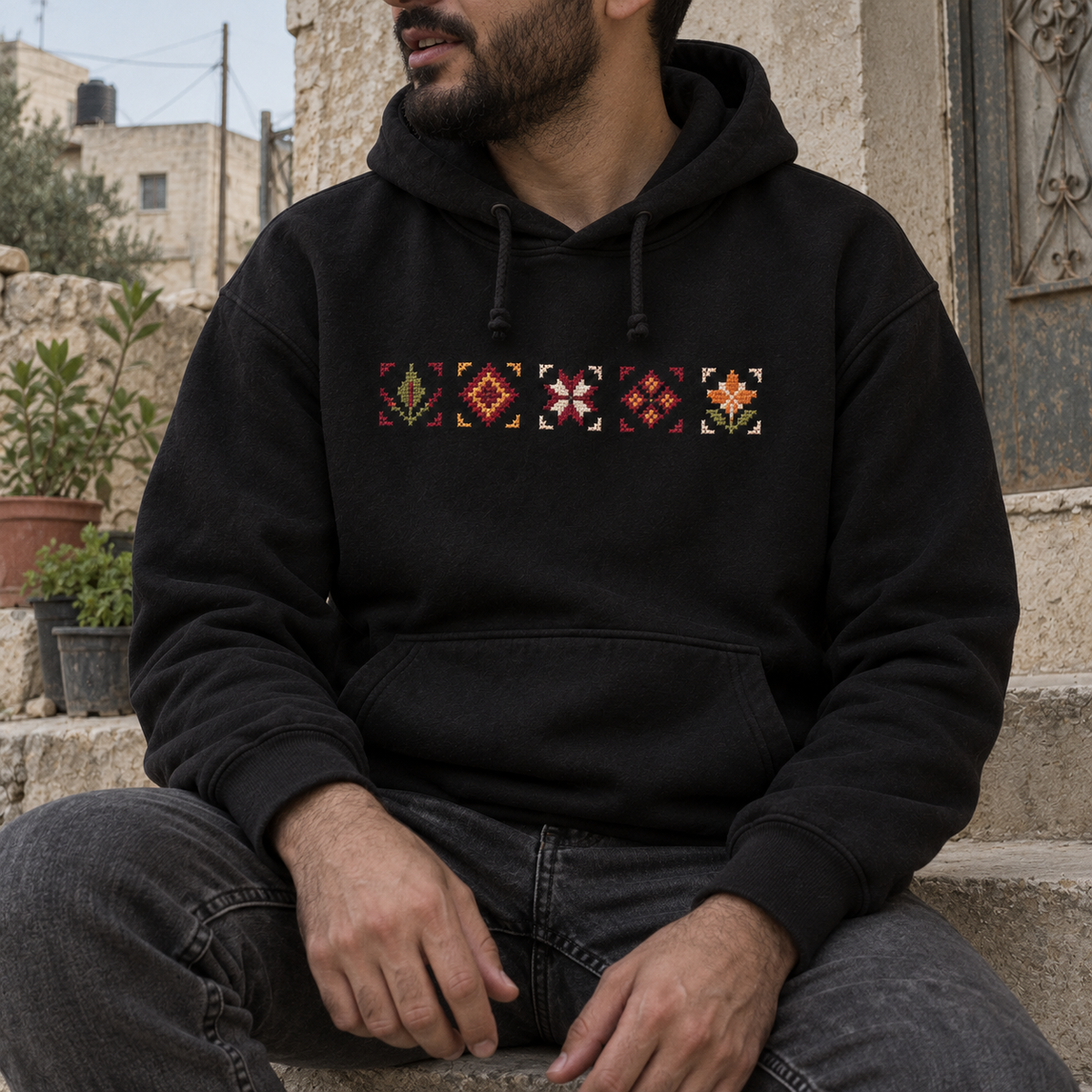Black Palestine Places Tatreez Hoodie - model view