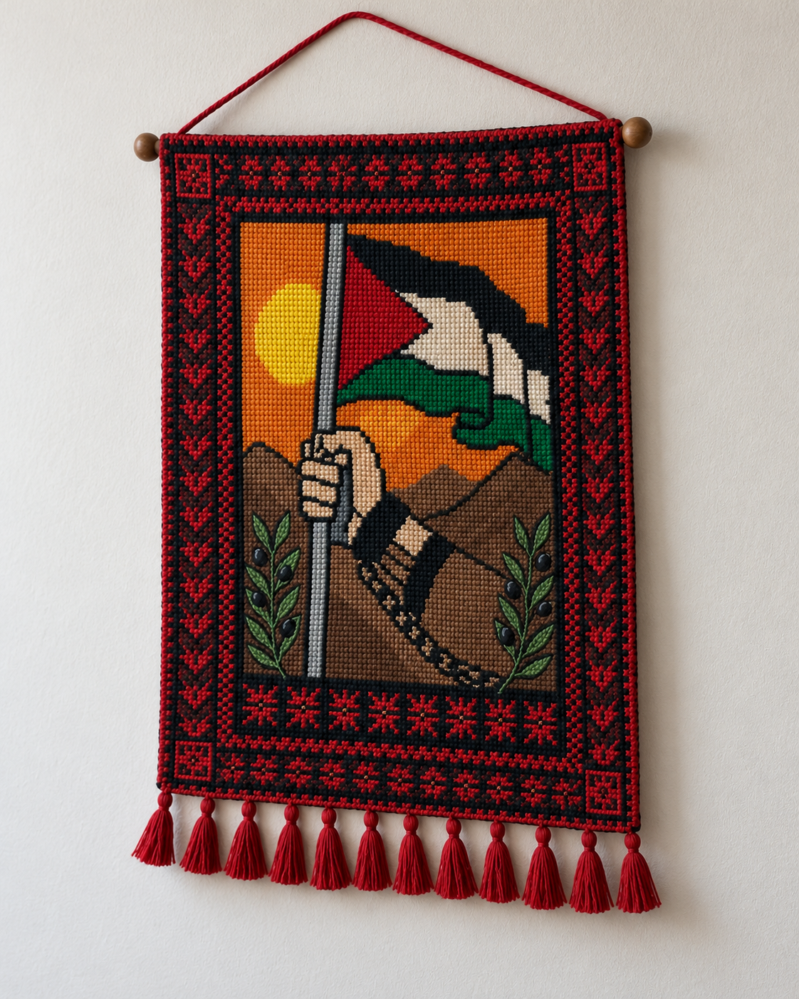 Design preview of the tatreez wall hanging displayed on a wall
