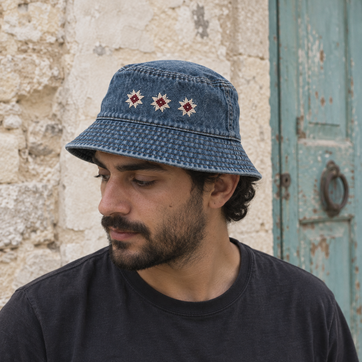Three Star Tatreez Bucket Hat - Denim worn on an adult model