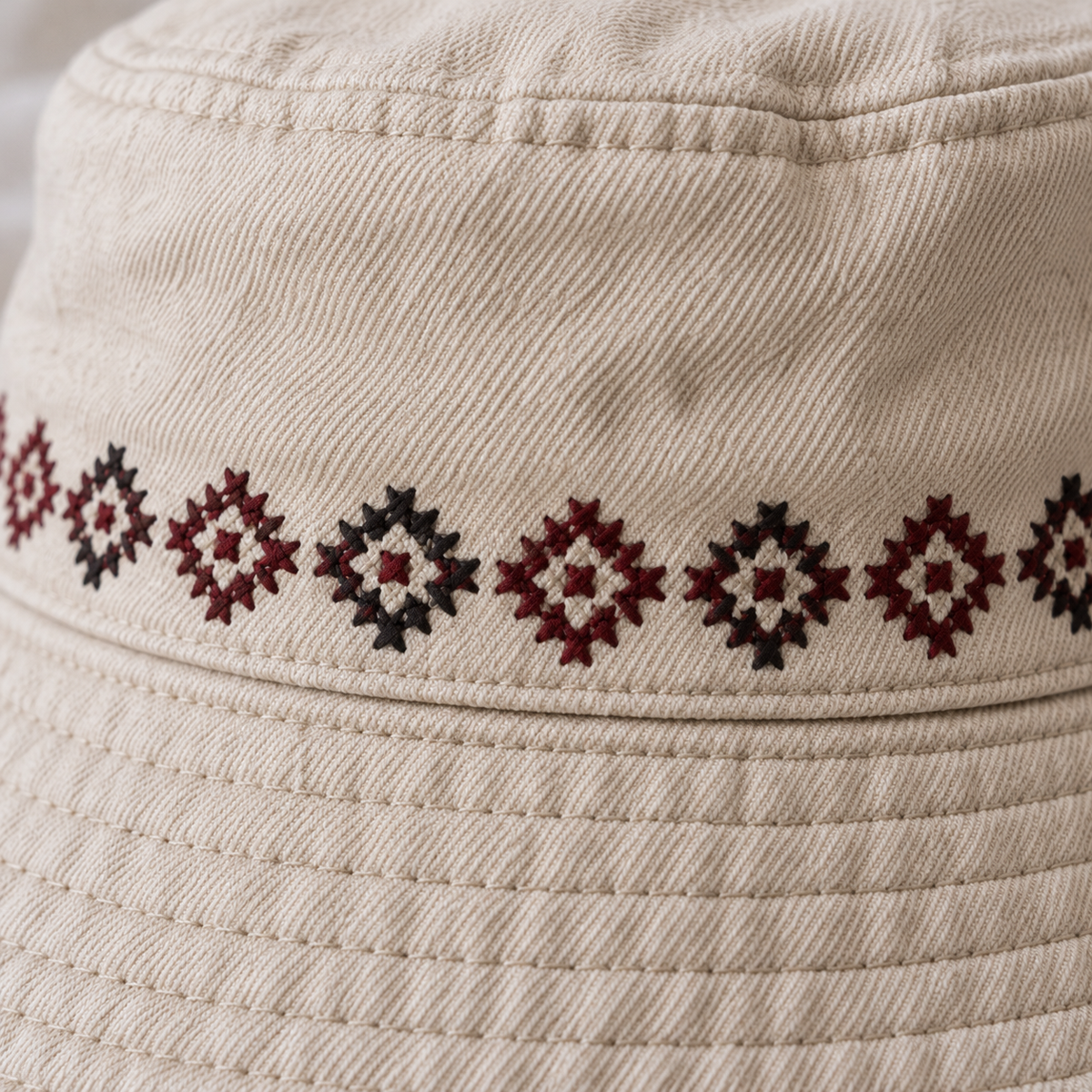 Tatreez Band Bucket Hat - Oatmeal - close-up of Palestinian tatreez stitching