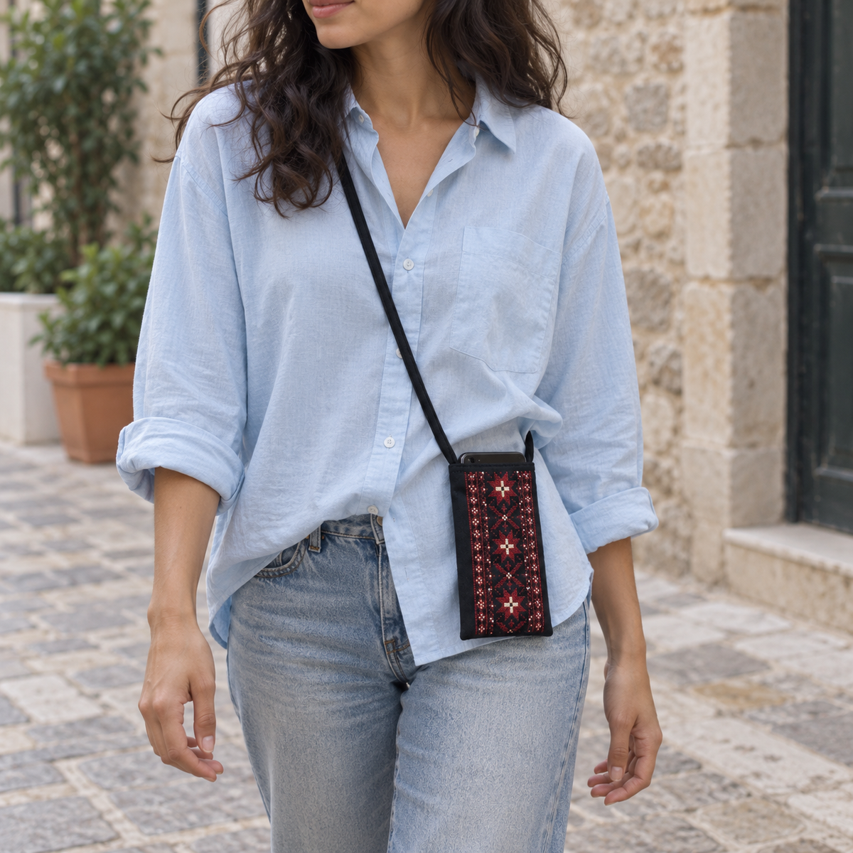 Red Geometric Tatreez Phone Pouch - Black - worn crossbody with a phone