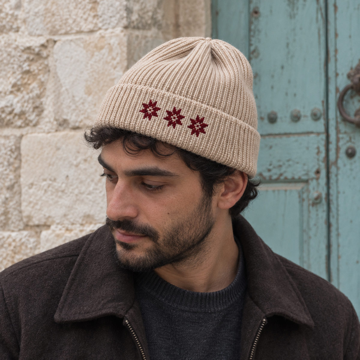 Three Star Tatreez Beanie - Oatmeal worn on an adult model
