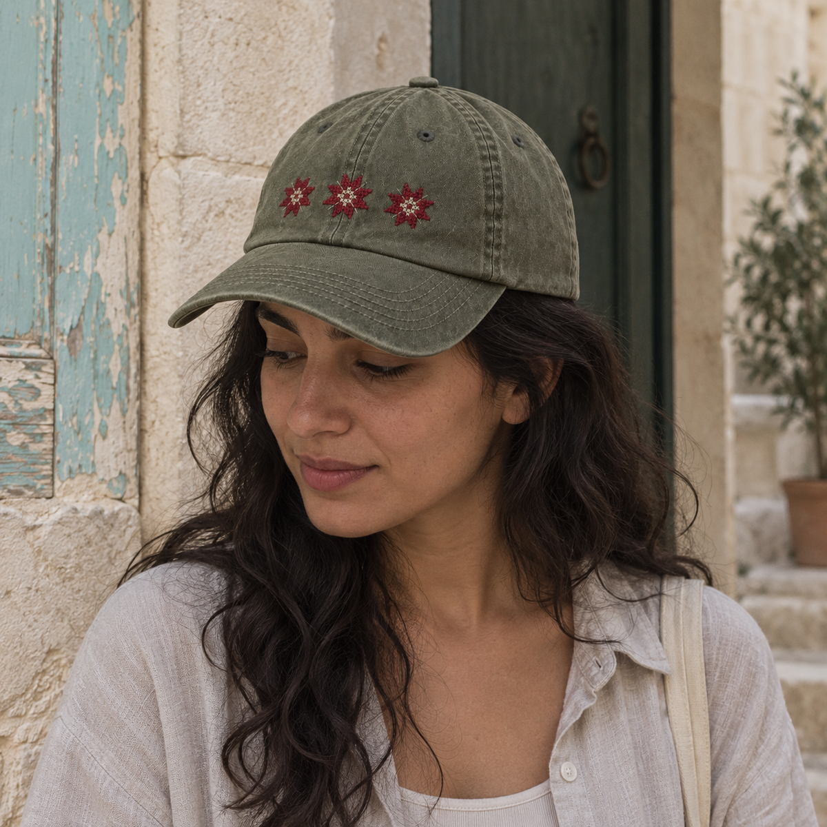 Three Star Tatreez Cap - Olive worn on an adult model