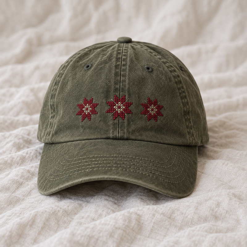Washed olive cap with three small burgundy eight-point geometric stars.